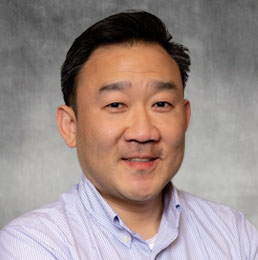 headshot of Sam Kim